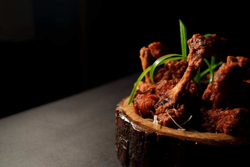 Dave's hot chicken team preparing Nashville-style hot chicken in New York